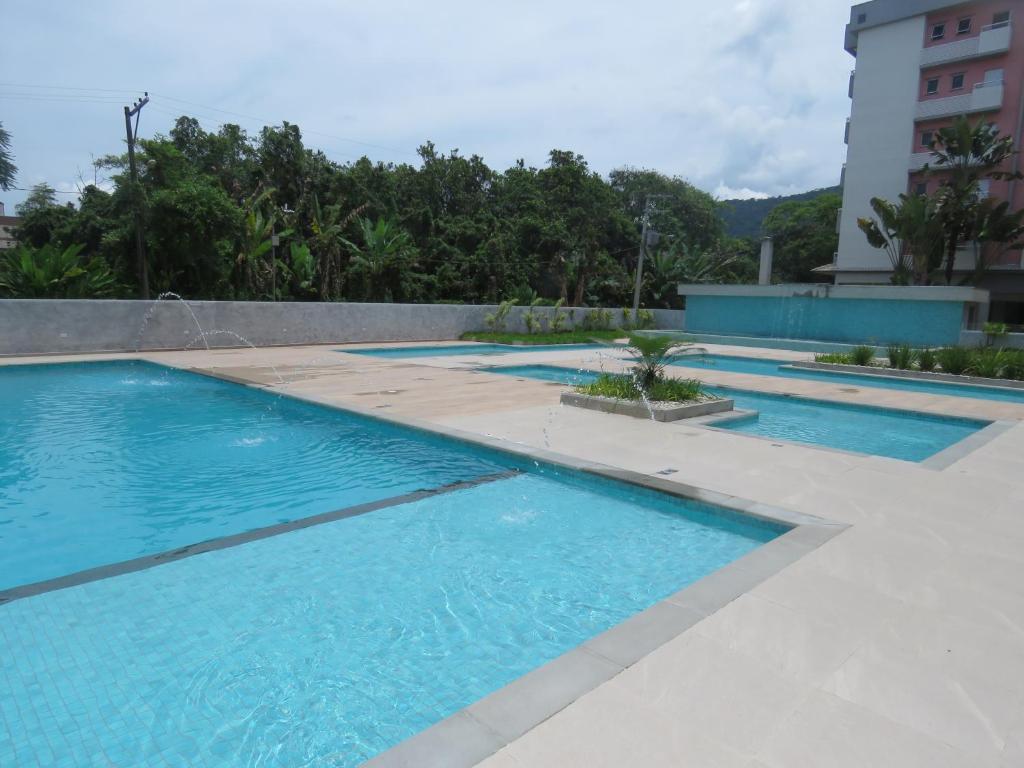  Lindo apartamento novo com piscinas no Pereque Açu Condominio Passaredo