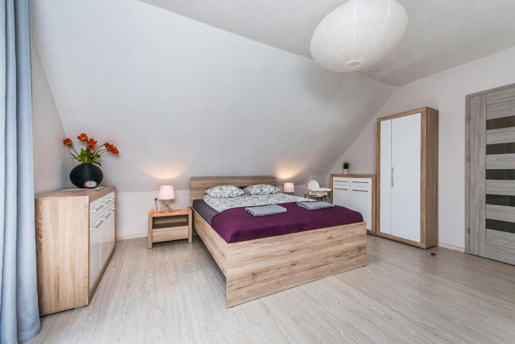 Posteľ alebo postele v izbe v ubytovaní Dom Kaszubski nr 65