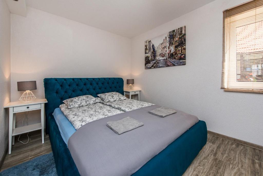 Posteľ alebo postele v izbe v ubytovaní Dom Kaszubski nr 65