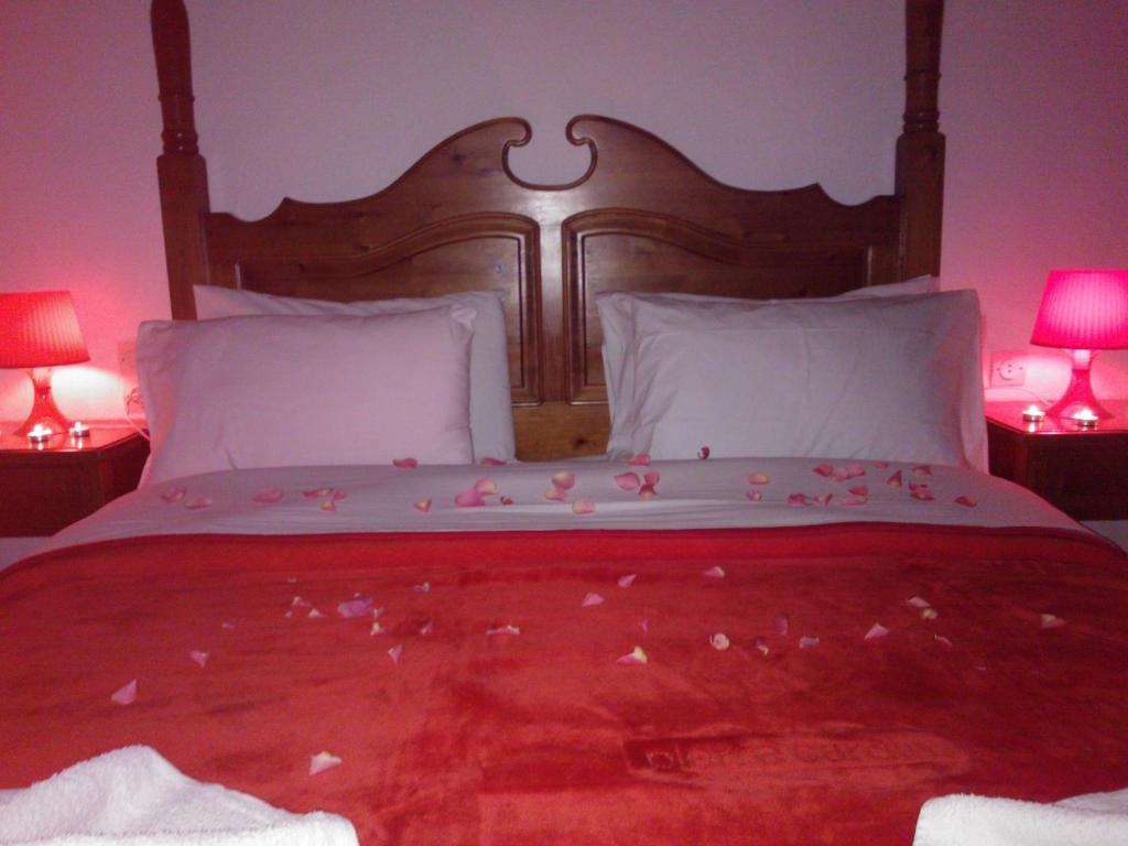 Posteľ alebo postele v izbe v ubytovaní Guesthouse Rousis