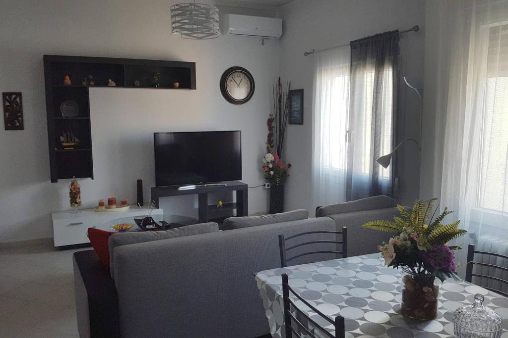 Televízia a/alebo spoločenská miestnosť v ubytovaní cELLATE cozy home