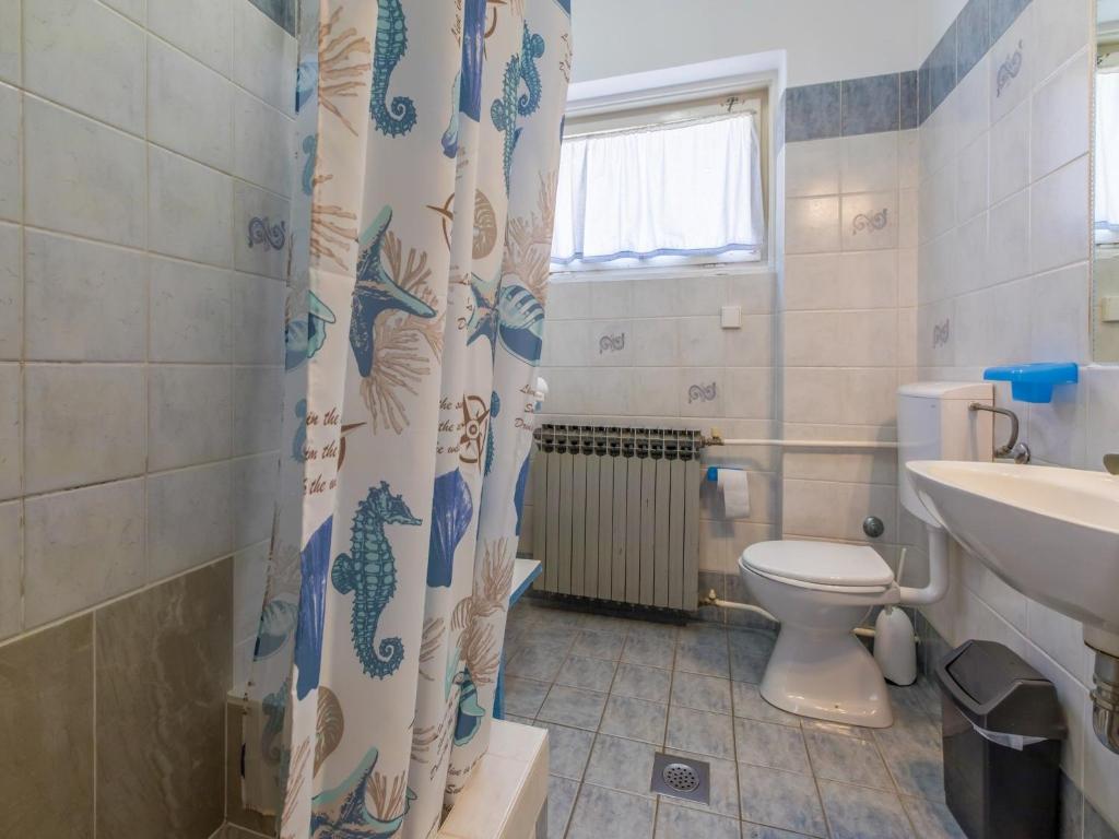 Koupelna v ubytování Apartment Roni