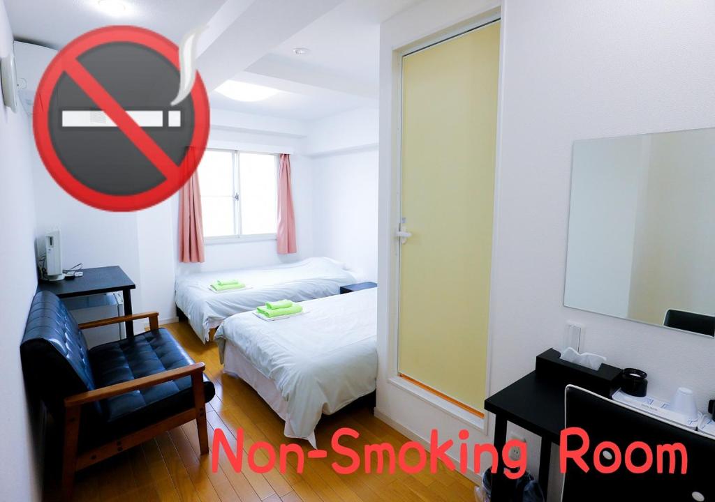 Postel nebo postele na pokoji v ubytování ホテル中央セレーネ Hotel CHUO SELENE