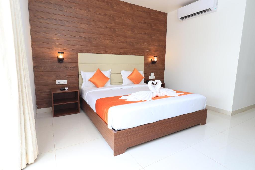 Postel nebo postele na pokoji v ubytování Miranda Beach Resort Baga