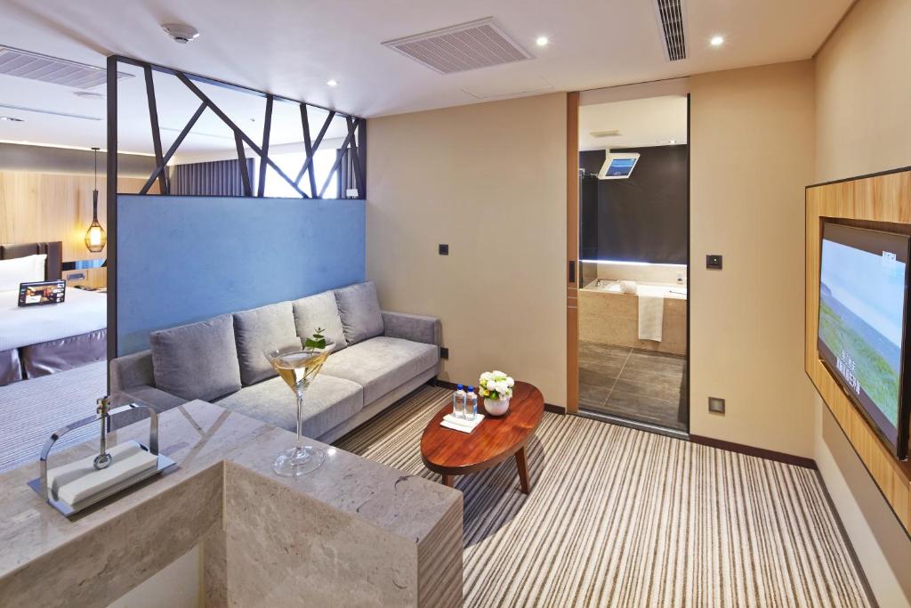 TV a/nebo společenská místnost v ubytování La Vida Hotel