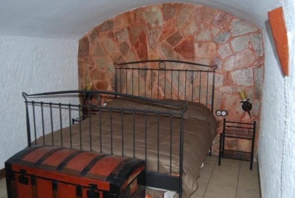 Postel nebo postele na pokoji v ubytování Cueva El Haro