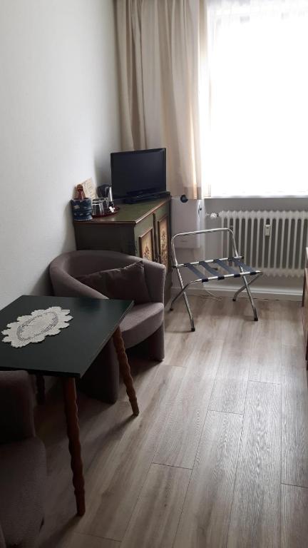 TV a/nebo společenská místnost v ubytování Hotel Central