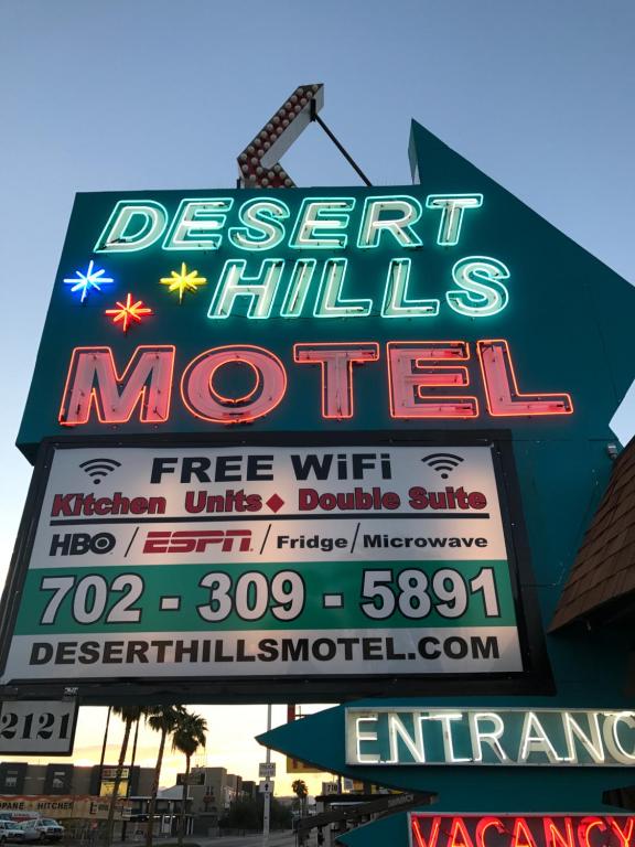 a large sign for a fast food restaurant at Desert Hills Motel in Las Vegas
