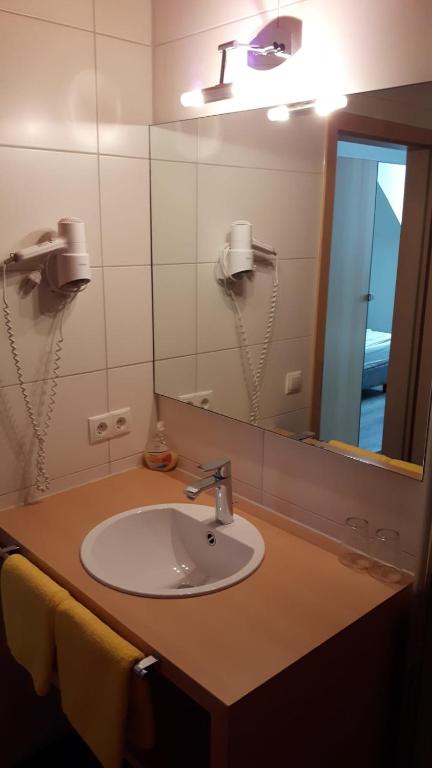 Koupelna v ubytování Hotel Central