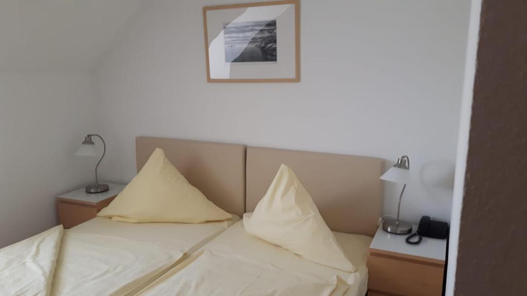 Postel nebo postele na pokoji v ubytování Hotel Central