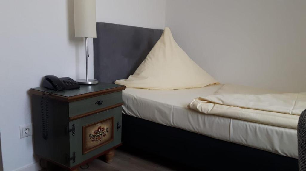 Postel nebo postele na pokoji v ubytování Hotel Central