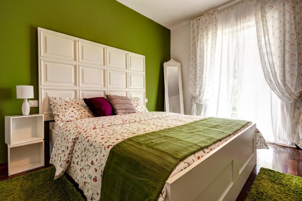 Łóżko lub łóżka w pokoju w obiekcie Villa Parenzana