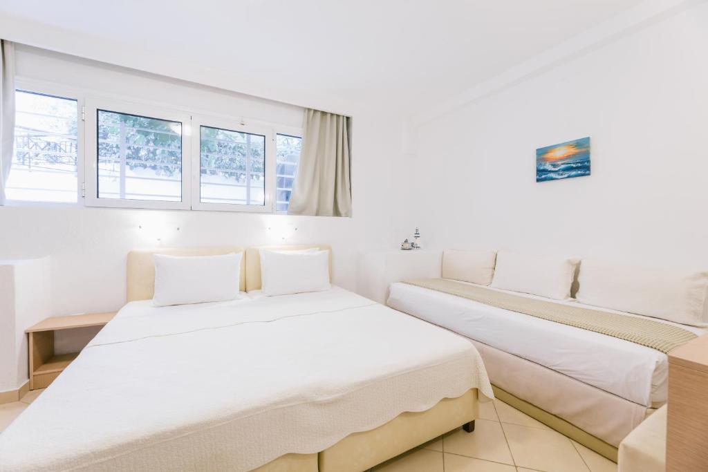 Postel nebo postele na pokoji v ubytování Anastasia Apartments Hanioti
