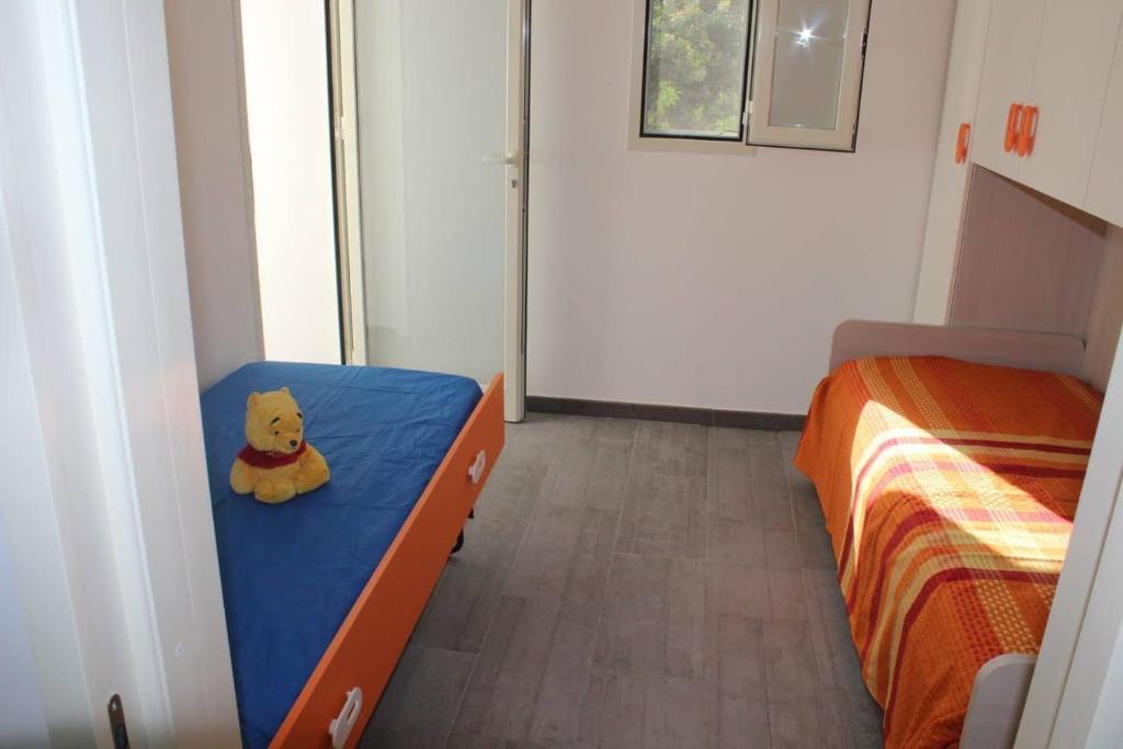 Postel nebo postele na pokoji v ubytování Sun Home