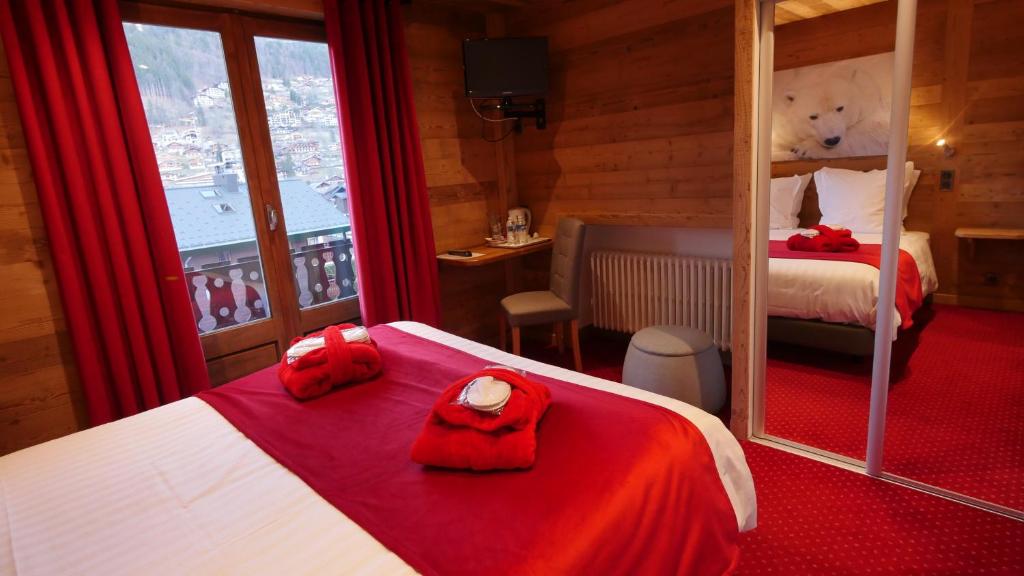 Postel nebo postele na pokoji v ubytování Hotel Bel'alpe