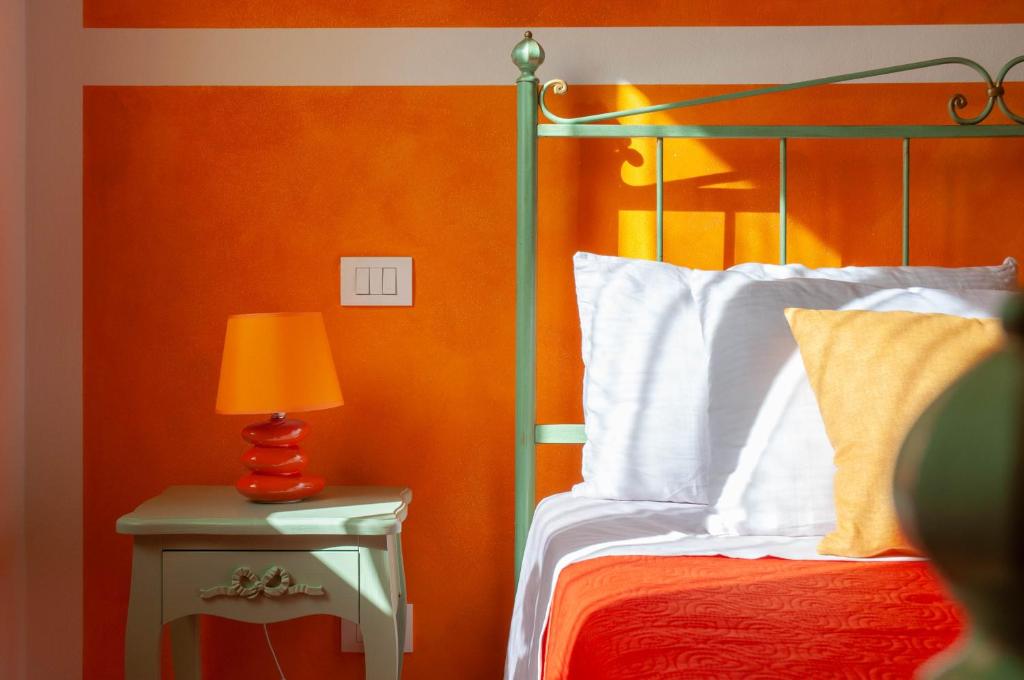 A bed or beds in a room at La casa di Nunzi