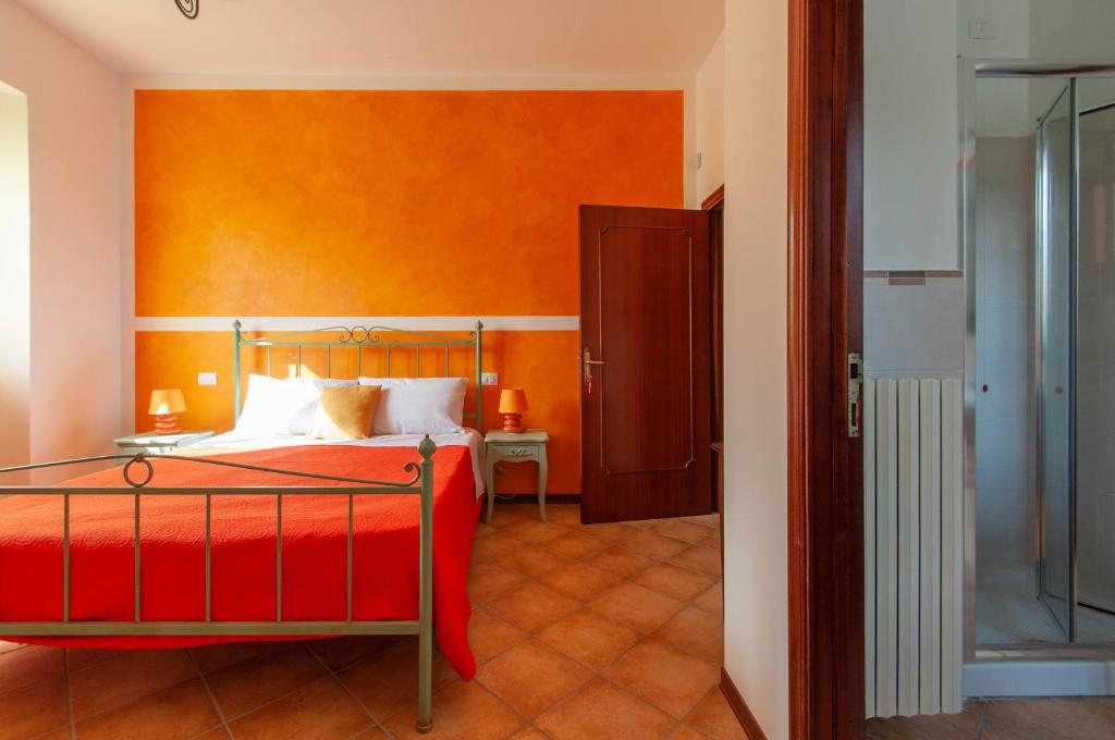 A bed or beds in a room at La casa di Nunzi
