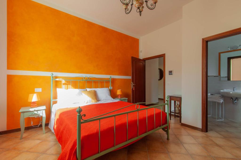 A bed or beds in a room at La casa di Nunzi
