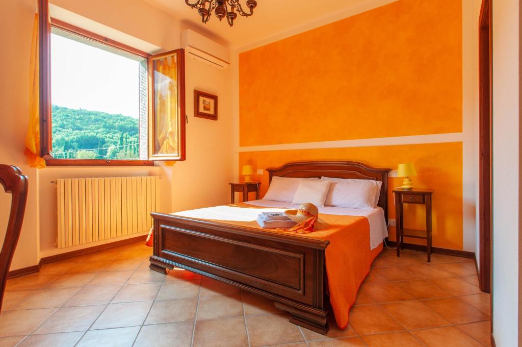 A bed or beds in a room at La casa di Nunzi