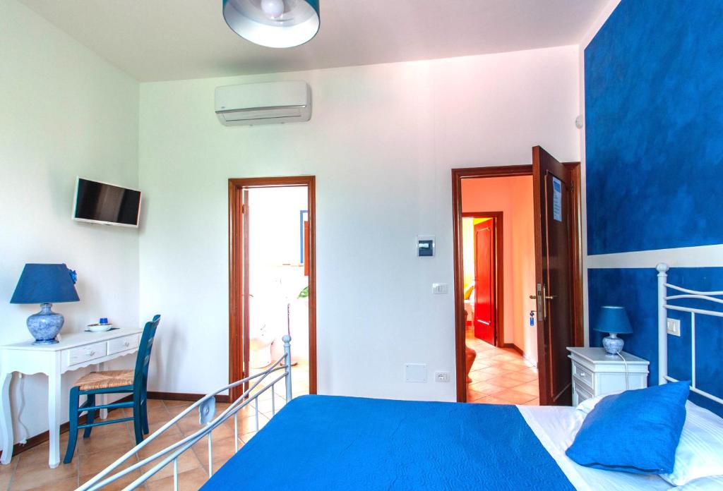 A bed or beds in a room at La casa di Nunzi