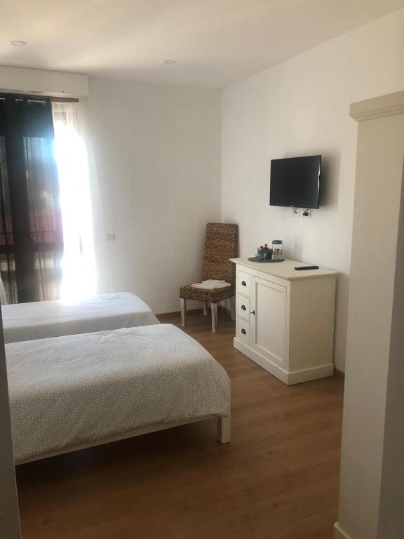 Televízia a/alebo spoločenská miestnosť v ubytovaní A casa di Titty