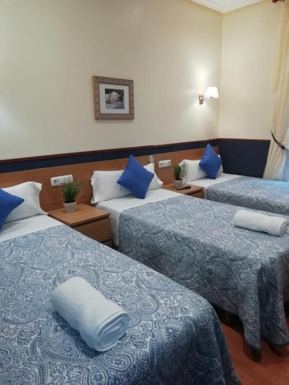 Cama o camas de una habitación en Pensión San Jerónimo