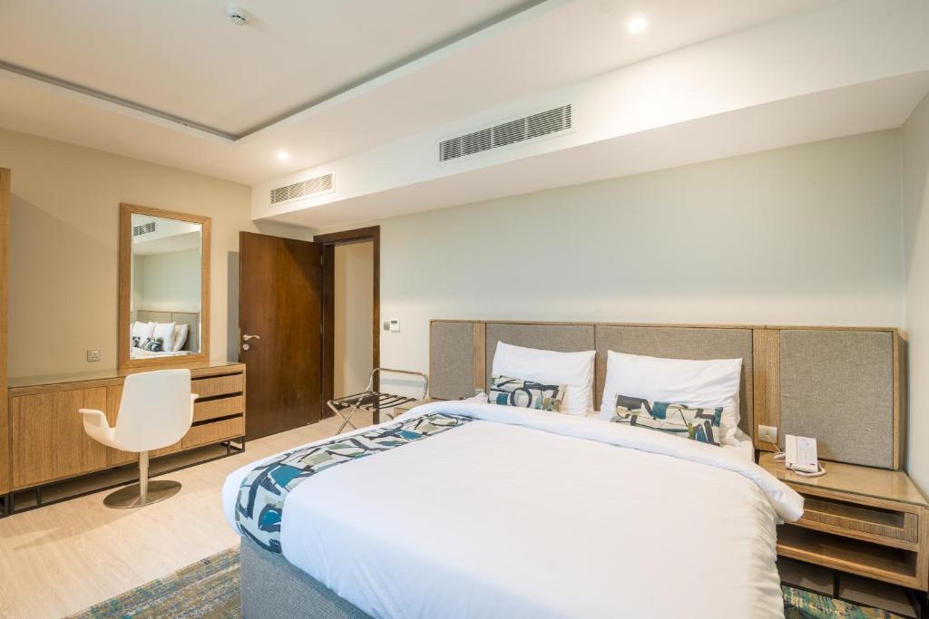 Giường trong phòng chung tại Ewaa Express Hotel - Gaber