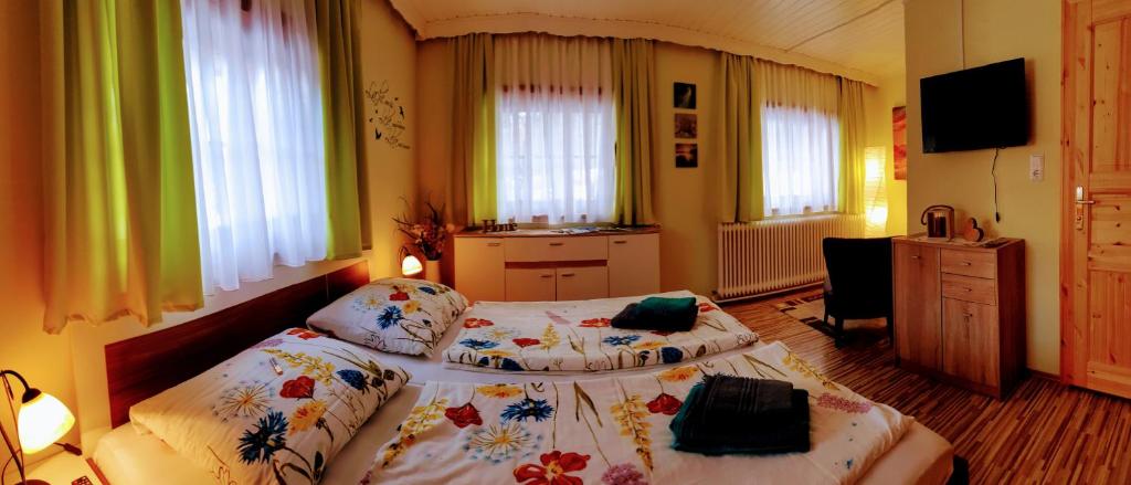 Postel nebo postele na pokoji v ubytování Mühlnerhof Familie Gruber