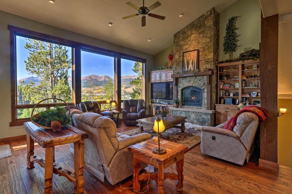 a living room filled with furniture and a fireplace at Breck Mtn Home with Hot Tub and Game Room! in Breckenridge