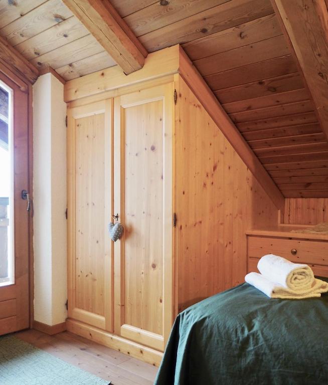 A bed or beds in a room at Appartamenti De Betta