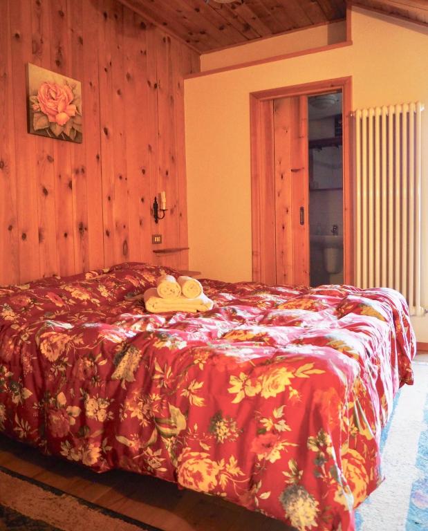 A bed or beds in a room at Appartamenti De Betta