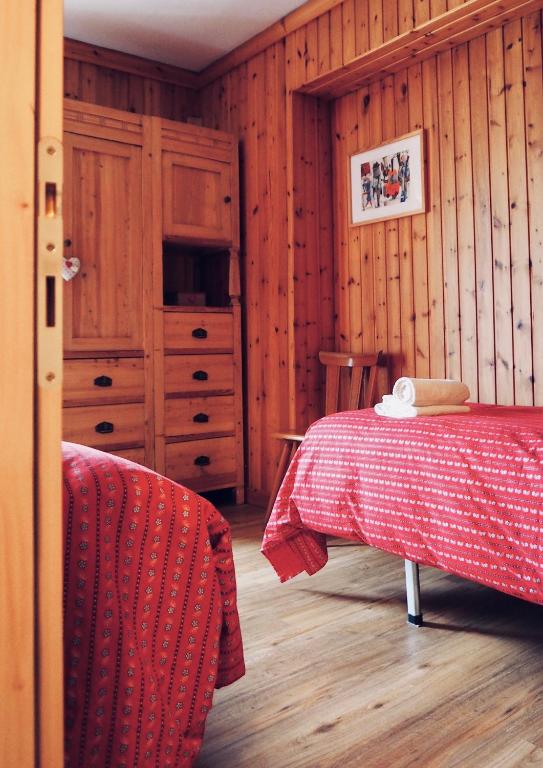 A bed or beds in a room at Appartamenti De Betta