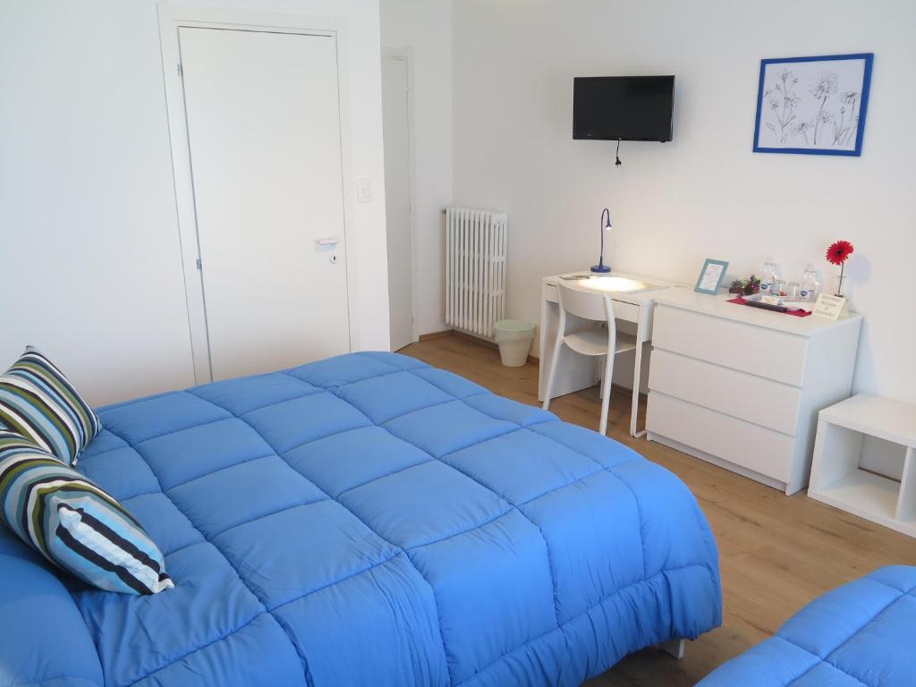 Postel nebo postele na pokoji v ubytování AnconaBed