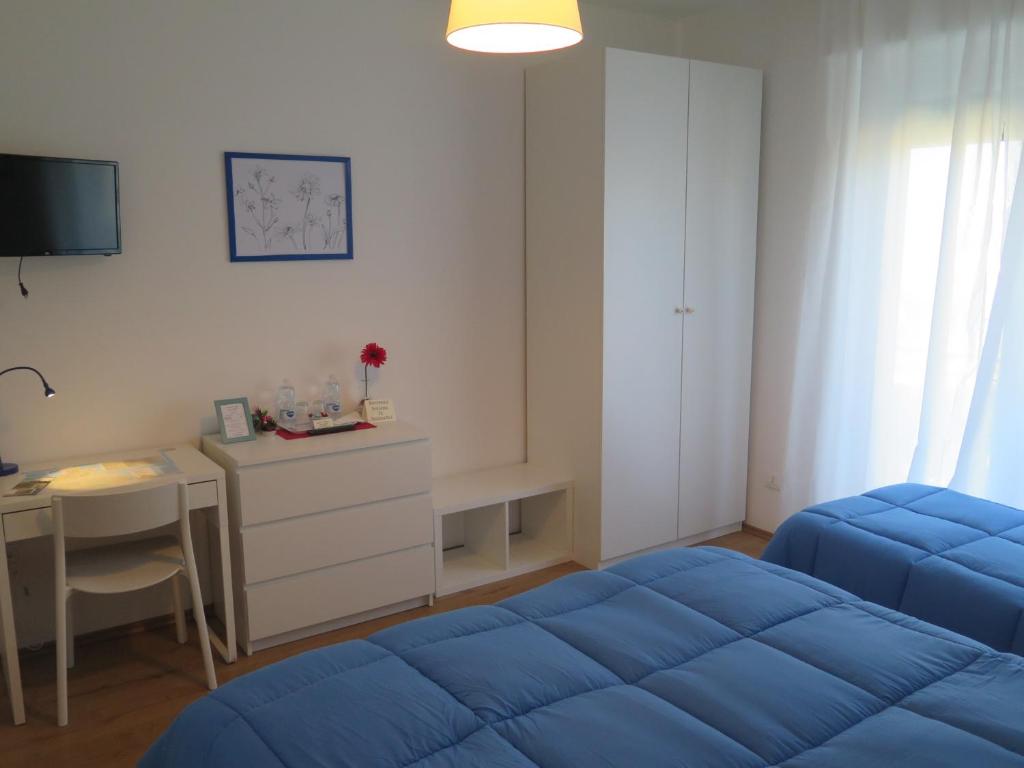Postel nebo postele na pokoji v ubytování AnconaBed