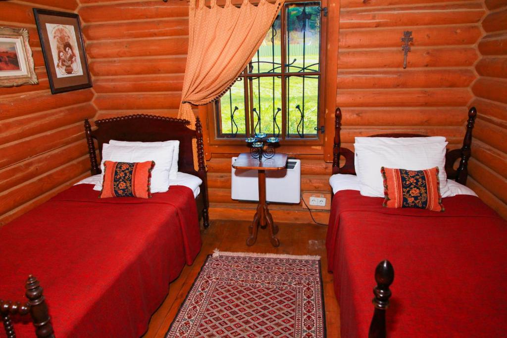 Postel nebo postele na pokoji v ubytování Hotel Khatky Ruslany