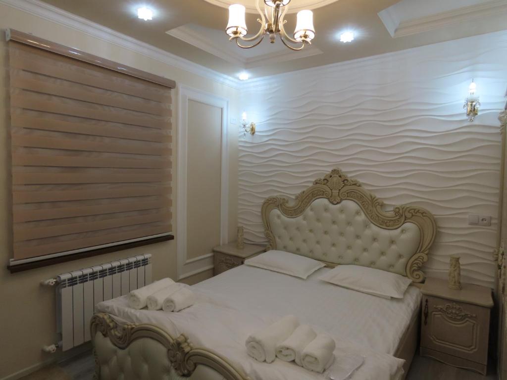 Primestay Samarkand Residences 객실 침대