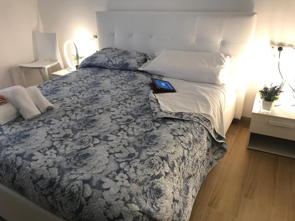 Postel nebo postele na pokoji v ubytování B&B Home Sweet Home - Affitti Brevi Italia