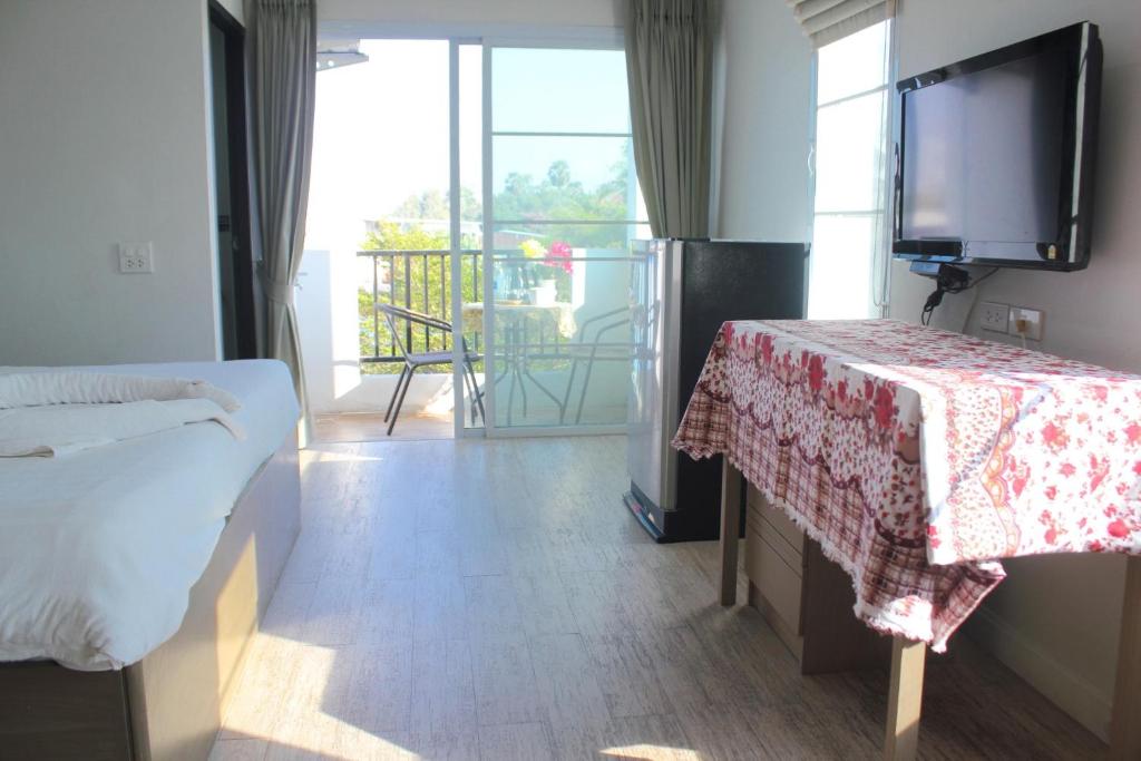 Postel nebo postele na pokoji v ubytování Plus Hotel