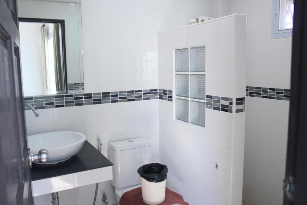 Koupelna v ubytování Plus Hotel