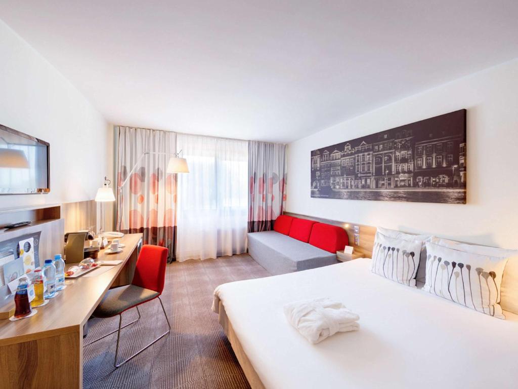 Posteľ alebo postele v izbe v ubytovaní Novotel Poznań Malta