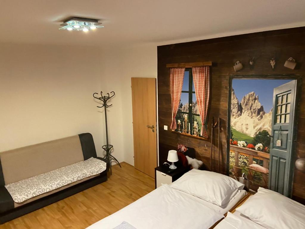 Postel nebo postele na pokoji v ubytování Apartmány Viktorka