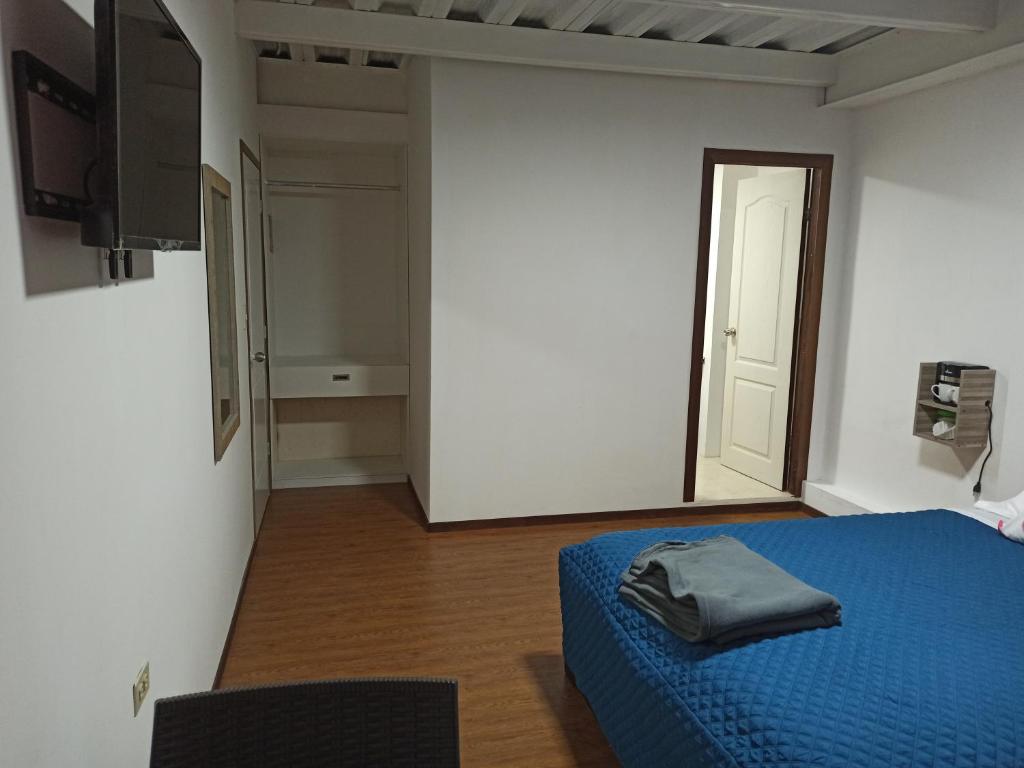 TV a/nebo společenská místnost v ubytování Habitaciones Alkimya