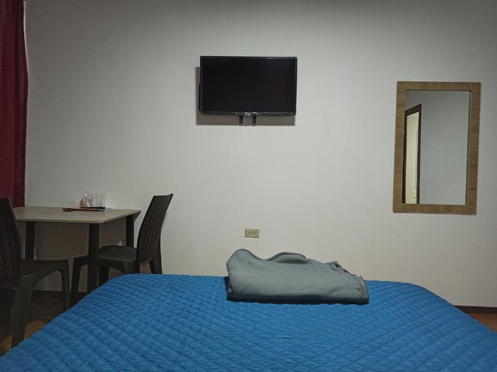 Postel nebo postele na pokoji v ubytování Habitaciones Alkimya