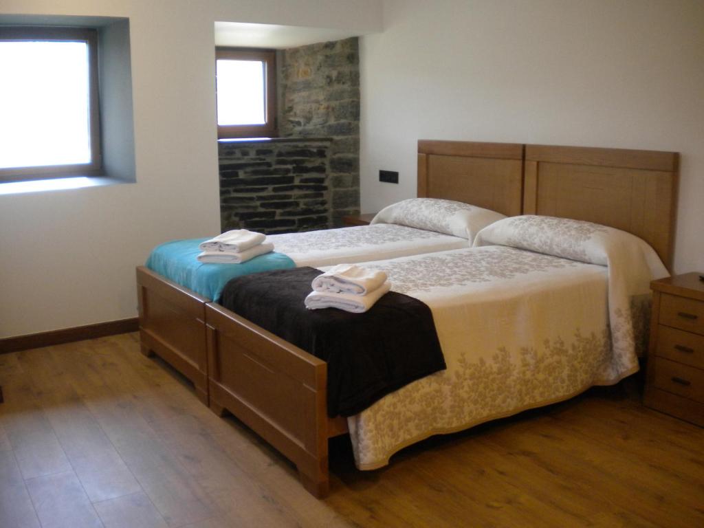 Postel nebo postele na pokoji v ubytování Casa de Aldea Araceli