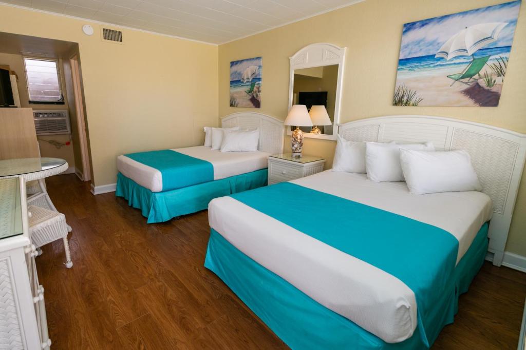 Postel nebo postele na pokoji v ubytování Aztec Motel Wildwood Crest Beach