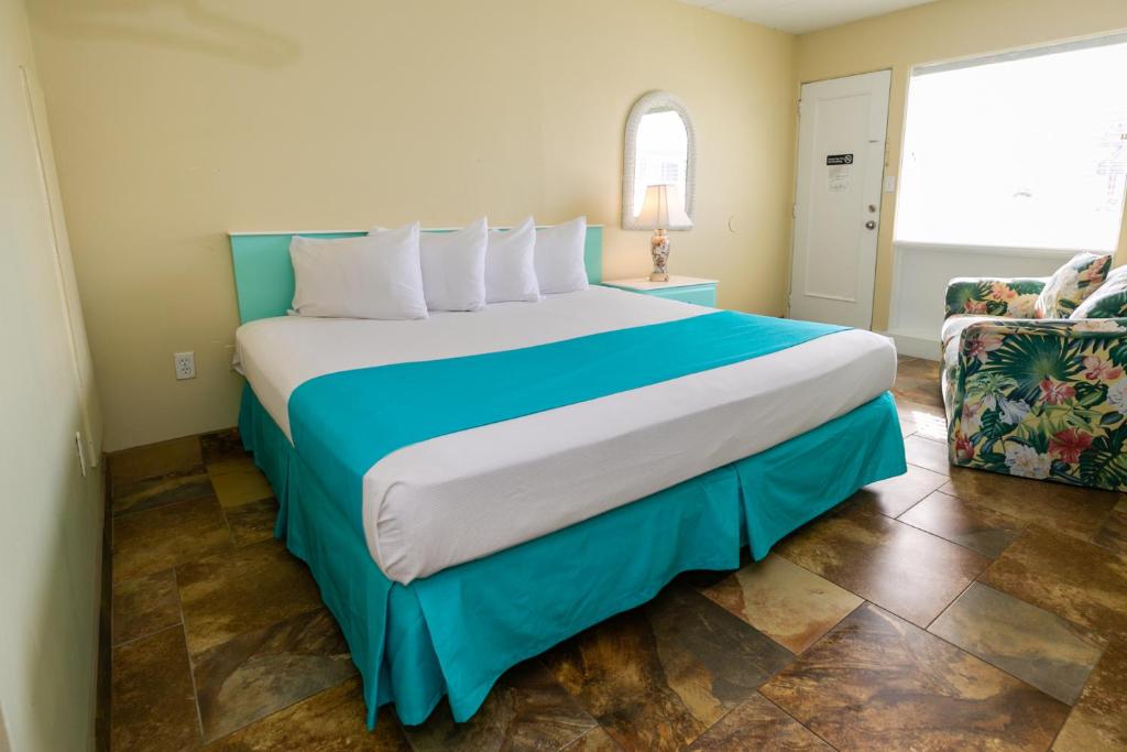 Postel nebo postele na pokoji v ubytování Aztec Motel Wildwood Crest Beach