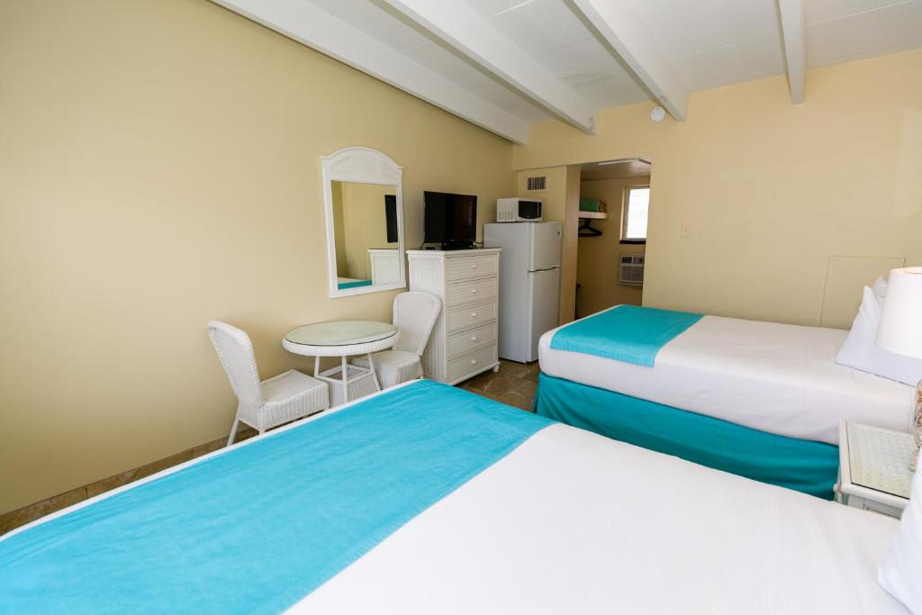 Postel nebo postele na pokoji v ubytování Aztec Motel Wildwood Crest Beach