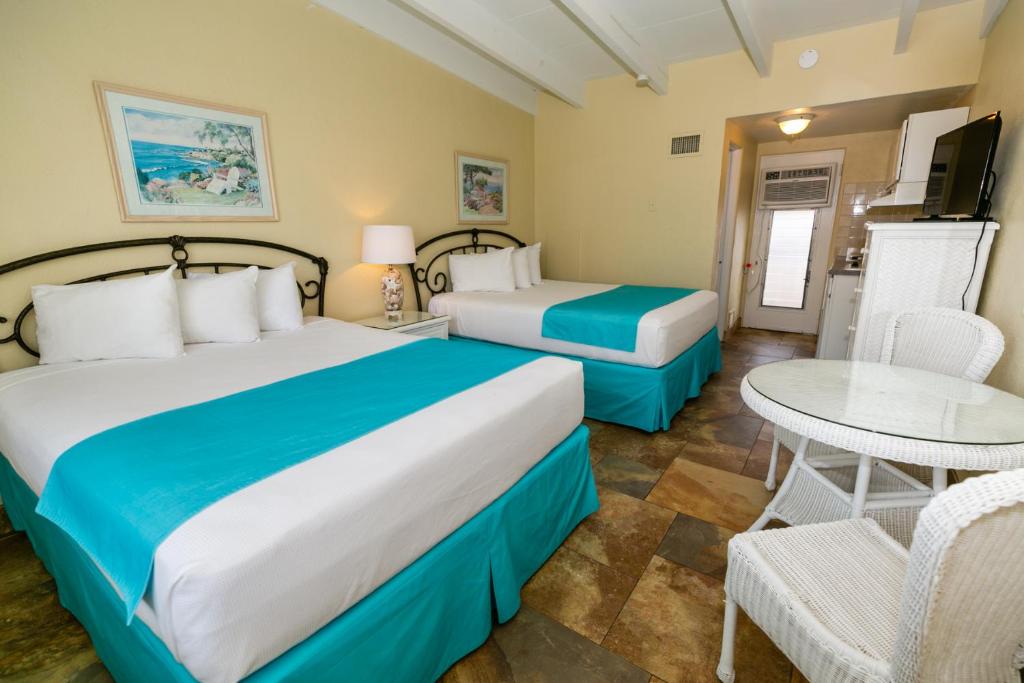 Postel nebo postele na pokoji v ubytování Aztec Motel Wildwood Crest Beach