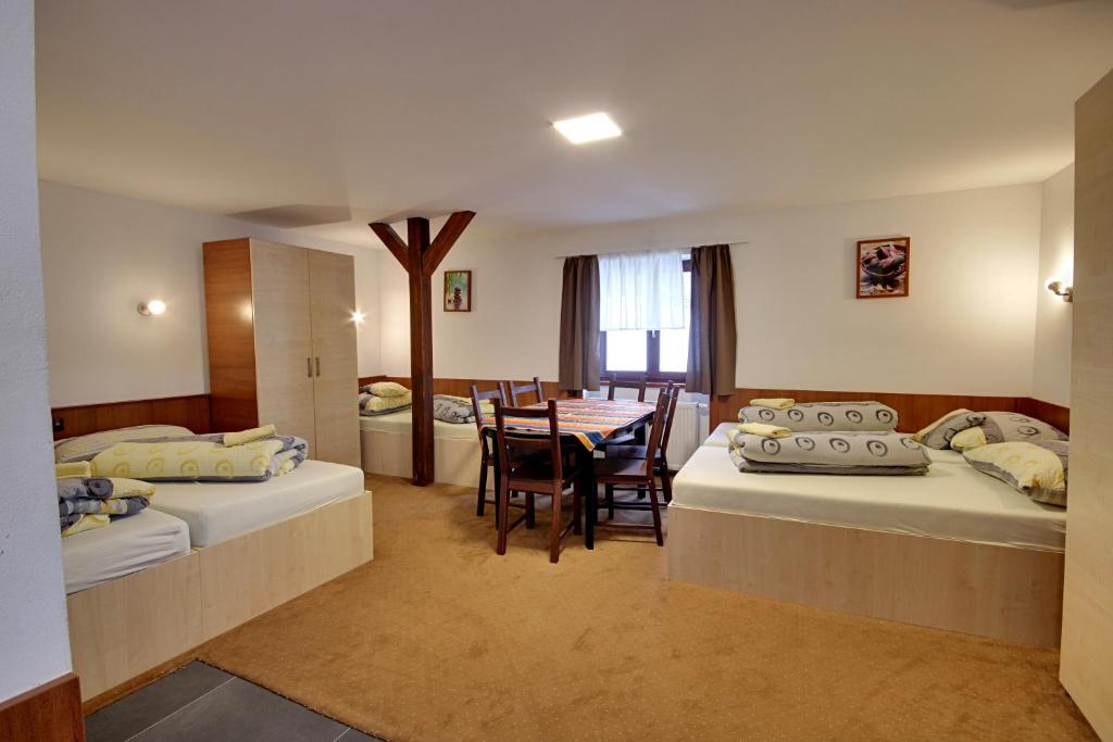 Postel nebo postele na pokoji v ubytování Apartmany Kadleců