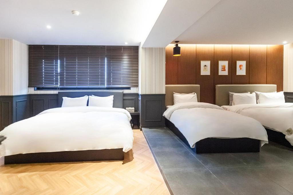 Brown Dot Hotel Seomyeonにあるベッド